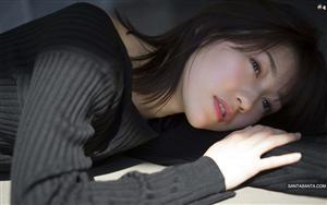 Japanese singer Mayu Watanabe looks lost in her thoughts